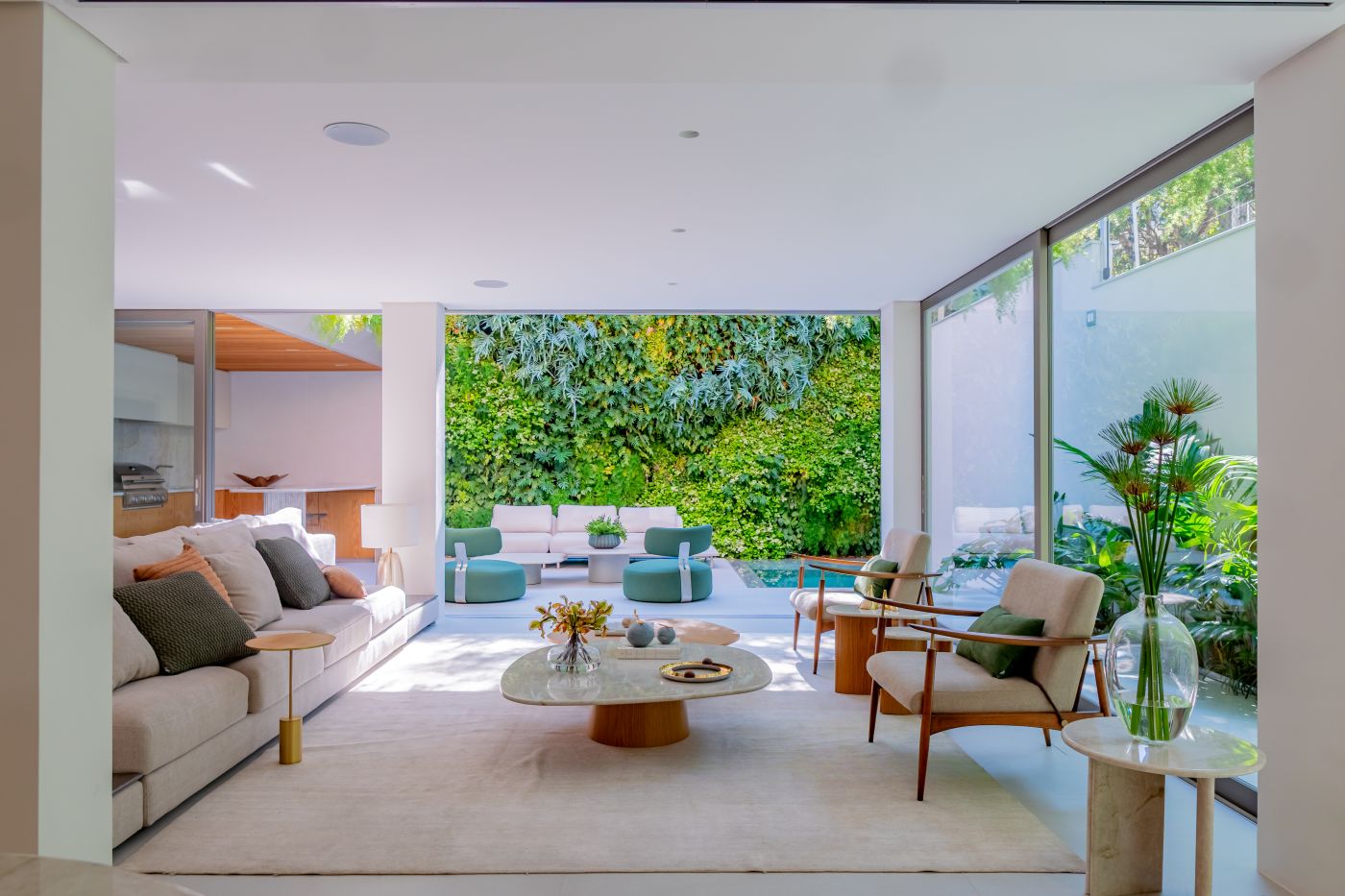 Subtle renovation turns 1980s house into a nature-focused home in São Paulo